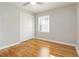 Bright bedroom with a closet, window and wooden floor, offering a comfortable space at 1796 Arkose Se Dr, Atlanta, GA 30316