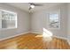 Well-lit bedroom with hardwood floors, natural light and a ceiling fan for added comfort at 1796 Arkose Se Dr, Atlanta, GA 30316