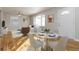 Bright living room featuring hardwood floors, neutral decor, ample natural light, and a dining area at 1796 Arkose Se Dr, Atlanta, GA 30316