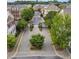 Scenic aerial view of the community's gated entrance, showcasing the well-maintained streets and lush greenery at 4206 Whitby Se Way # 15, Smyrna, GA 30080