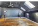 Loft bonus room with hardwood floors, ceiling fan, and two skylights at 4206 Whitby Se Way # 15, Smyrna, GA 30080