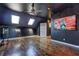 Bonus room features wood floors, a ceiling fan, and art at 4206 Whitby Se Way # 15, Smyrna, GA 30080