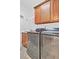 Laundry room features a large stainless steel washer and dryer at 4206 Whitby Se Way # 15, Smyrna, GA 30080