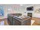 Inviting living room featuring a cozy fireplace, built-in shelving, and a comfortable sectional sofa at 4206 Whitby Se Way # 15, Smyrna, GA 30080