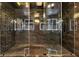 Main bathroom featuring a walk-in shower, dark tile, and modern design at 4206 Whitby Se Way # 15, Smyrna, GA 30080