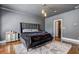 Elegant main bedroom with dark walls, wood floors, and modern lighting at 4206 Whitby Se Way # 15, Smyrna, GA 30080