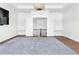 Expansive bedroom featuring a tray ceiling, French doors, and dual vanities creating an inviting space at 6355 Westfallen Overlook, Cumming, GA 30040