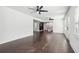 View of open concept living room into modern kitchen at 7540 Conyers St, Lithonia, GA 30058