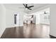 Spacious living room with open floor plan to kitchen and bathroom at 7540 Conyers St, Lithonia, GA 30058