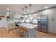 Modern kitchen features white cabinets, marble backsplash, and stainless steel appliances at 82 Dearborn Se St, Atlanta, GA 30317