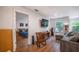 Cozy living room leading to a bedroom with a comfortable blue bed at 82 Dearborn Se St, Atlanta, GA 30317