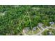 Aerial view showcasing the property's boundaries and surrounding wooded area at 102 Woodsfield Ln, Hiram, GA 30141