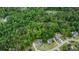 An aerial view of the neighborhood featuring lush greenery and tree coverage at 102 Woodsfield Ln, Hiram, GA 30141