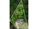 Aerial view highlighting property lines and surrounding greenery at 102 Woodsfield Ln, Hiram, GA 30141