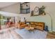 Spacious living room with an open layout, comfortable seating, and a modern kitchen in the background at 102 Woodsfield Ln, Hiram, GA 30141