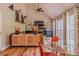 Open-concept area with modern decor, stylish furniture, and plenty of natural light streaming through large windows at 102 Woodsfield Ln, Hiram, GA 30141