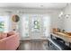 Cozy entryway with natural light, stylish decor, and a view of the front door at 1700 Prospect Way, Conyers, GA 30094