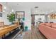 Open living space with modern decor, seamlessly connecting the living, dining, and kitchen areas at 1700 Prospect Way, Conyers, GA 30094