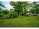 Lush backyard featuring trees and greenery at 2137 Delowe Dr, Atlanta, GA 30344