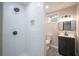 Modern bathroom features a tiled shower, sleek vanity, and updated fixtures at 2137 Delowe Dr, Atlanta, GA 30344
