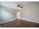 Bedroom featuring hardwood floors, neutral paint, and a ceiling fan at 2137 Delowe Dr, Atlanta, GA 30344