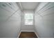 Spacious closet with built-in shelving and natural light from window at 2137 Delowe Dr, Atlanta, GA 30344