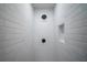 Modern shower with white tiled walls, rainfall showerhead, and built-in niche at 2137 Delowe Dr, Atlanta, GA 30344