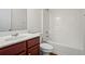 This bathroom features a modern vanity, toilet, and a shower-tub combination at 221 Cutbank Sw Ct, Atlanta, GA 30331