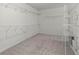 Walk-in closet with carpet and wire shelving for ample storage at 221 Cutbank Sw Ct, Atlanta, GA 30331