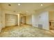 Unfinished basement with rough concrete floor, recessed lights and doors to adjacent rooms at 3601 Club Nw Dr, Kennesaw, GA 30144