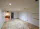 Unfinished basement space, ready for customization, with access to bathroom and kitchenette at 3601 Club Nw Dr, Kennesaw, GA 30144