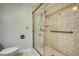 Bathroom with glass shower, tiled walls and floor at 3601 Club Nw Dr, Kennesaw, GA 30144