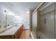 Bathroom featuring a vanity, shower-over-tub with sliding doors at 3601 Club Nw Dr, Kennesaw, GA 30144