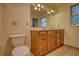 Bathroom with vanity, mirror and fixtures at 3601 Club Nw Dr, Kennesaw, GA 30144