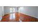 Large bedroom with hardwood floors and natural lighting at 3601 Club Nw Dr, Kennesaw, GA 30144