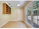 Versatile bonus room with built-in shelving and natural light from the outdoor view at 3601 Club Nw Dr, Kennesaw, GA 30144