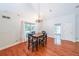 Cozy dining room with hardwood floors and natural light at 3601 Club Nw Dr, Kennesaw, GA 30144