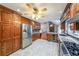 Eat-in kitchen featuring ample cabinet storage, stainless steel appliances, and easy access to dining and living areas at 3601 Club Nw Dr, Kennesaw, GA 30144