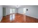 Bright main bedroom with hardwood floors and ensuite bathroom at 3601 Club Nw Dr, Kennesaw, GA 30144
