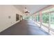Sunroom with many windows allowing for views of the backyard at 3601 Club Nw Dr, Kennesaw, GA 30144