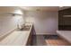 Basement area featuring a utility sink with laminate countertops and wooden cabinets at 3601 Club Nw Dr, Kennesaw, GA 30144