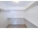 Walk-in closet with shelving provides ample storage for clothing and accessories at 3601 Club Nw Dr, Kennesaw, GA 30144