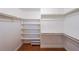 Spacious walk-in closet with shelving provides organized storage for your wardrobe and accessories at 3601 Club Nw Dr, Kennesaw, GA 30144