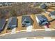 Aerial view of well-maintained homes with green lawns and inviting driveways at 422 Murphy Avenue, Canton, GA 30114