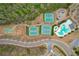Aerial view of community amenities including a pool, tennis courts, baseball, and playground at 422 Murphy Avenue, Canton, GA 30114