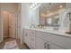Elegant bathroom features a double sink vanity with modern fixtures and a tiled floor at 422 Murphy Avenue, Canton, GA 30114