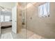 Beautiful bathroom with a walk-in shower enclosed in glass and modern tile work at 422 Murphy Avenue, Canton, GA 30114