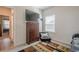 Bright bedroom with a large window, dresser, and modern decor at 422 Murphy Avenue, Canton, GA 30114