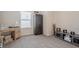 An office with a window, desk, wardrobe, and beige carpet at 422 Murphy Avenue, Canton, GA 30114