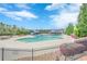 Stunning community pool area with a water slide, clubhouse, and comfortable seating at 422 Murphy Avenue, Canton, GA 30114